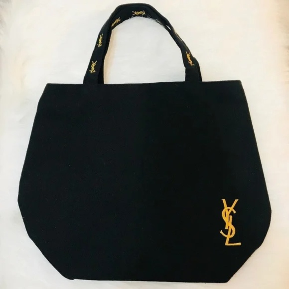 Yves Saint Laurent Black and Gold Perfume Bag